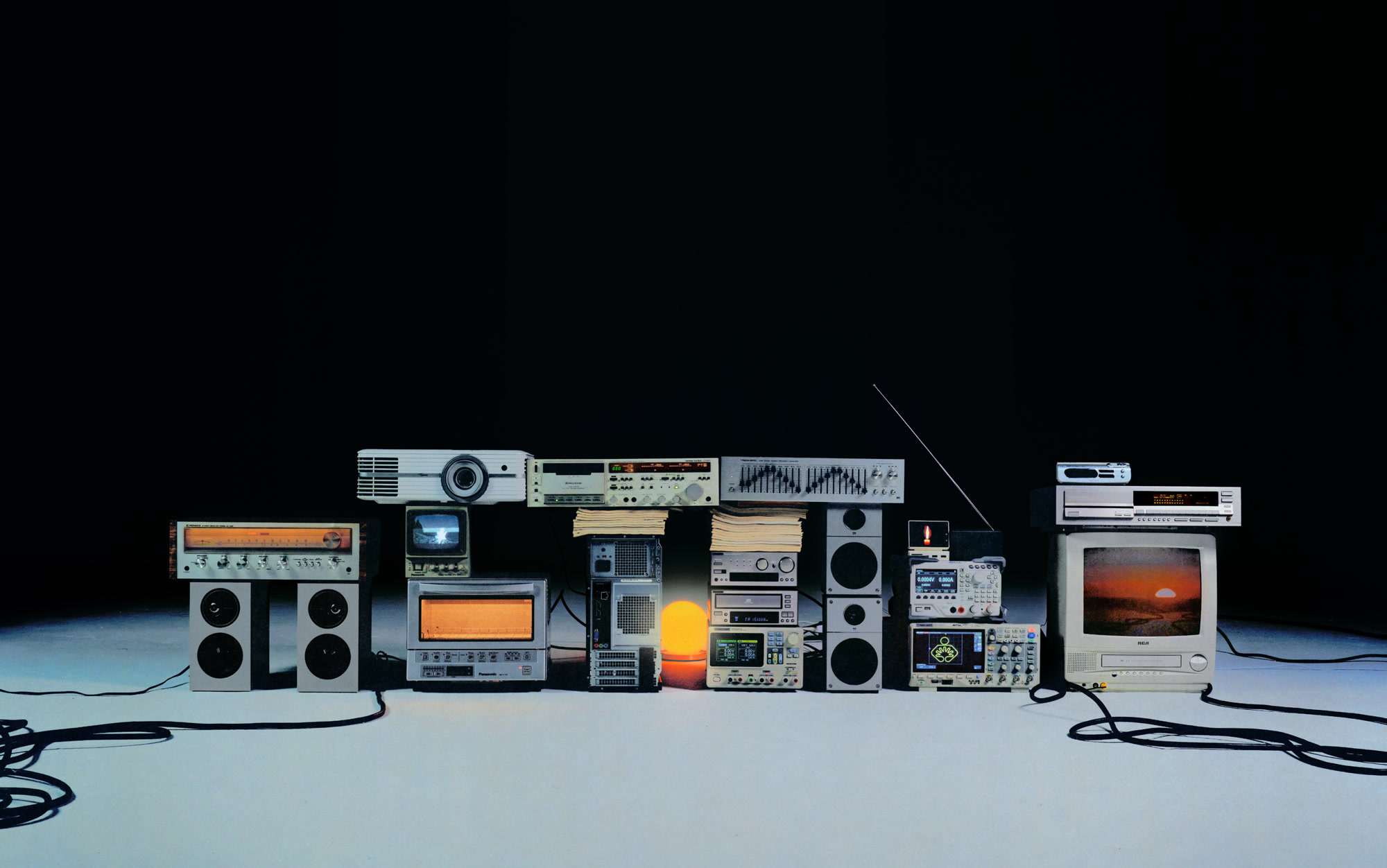 A replica of Stonehenge built out of an assortment of vintage electronics.